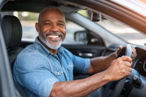 Male driver in a car