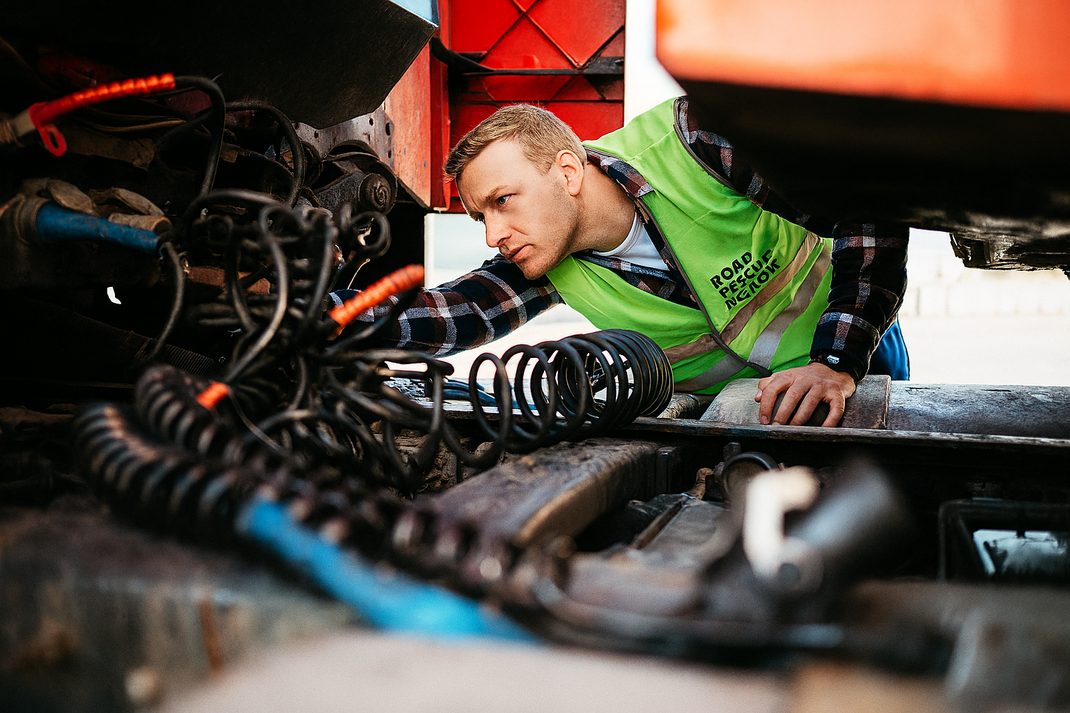 Mobile Diesel Mechanic working on a semi truck